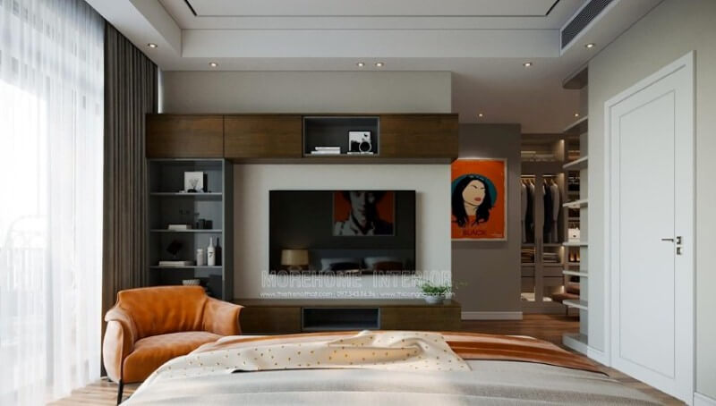 Sắp xếp phòng ngủ khéo léo với nhiều hộc tủ hiện đại, sang trọng.